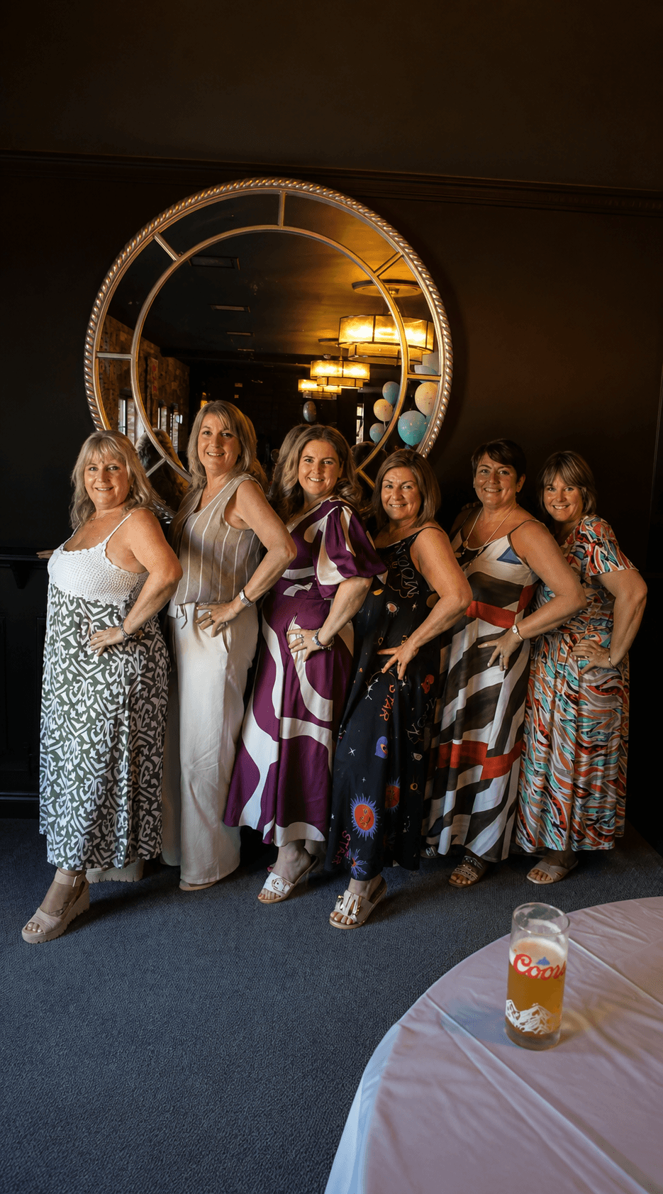A group of guests posing together at a christening at Fitzpatrick's